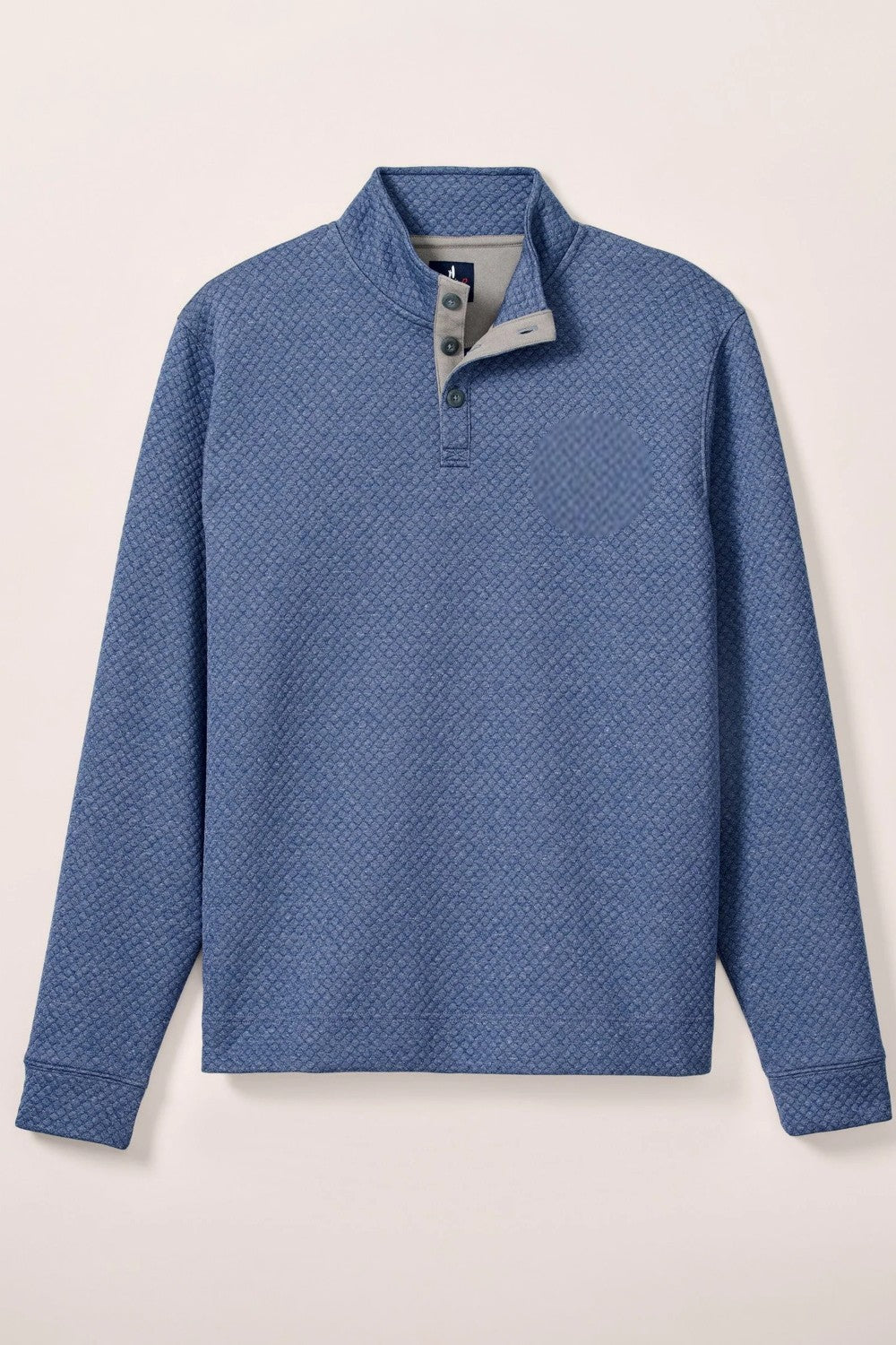 This pullover is made with a moratronic diamond knit which is different than a classic quilting stitch—the benefit is that unlike quilted styles that might lose a thread over the years, this will keep it's pattern forever. We also used alcantara performance suede details on the placket which is machine washable and what they used for upholstery in high end sports cars—pretty cool, if you ask us.