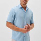 This knit button-down from our Hangin' Out Collection—which is designed to look its best untucked—is made with a modern seersucker fabric that breathes and moves better than the traditional. This is how you do elevated casual while staying completely comfortable.