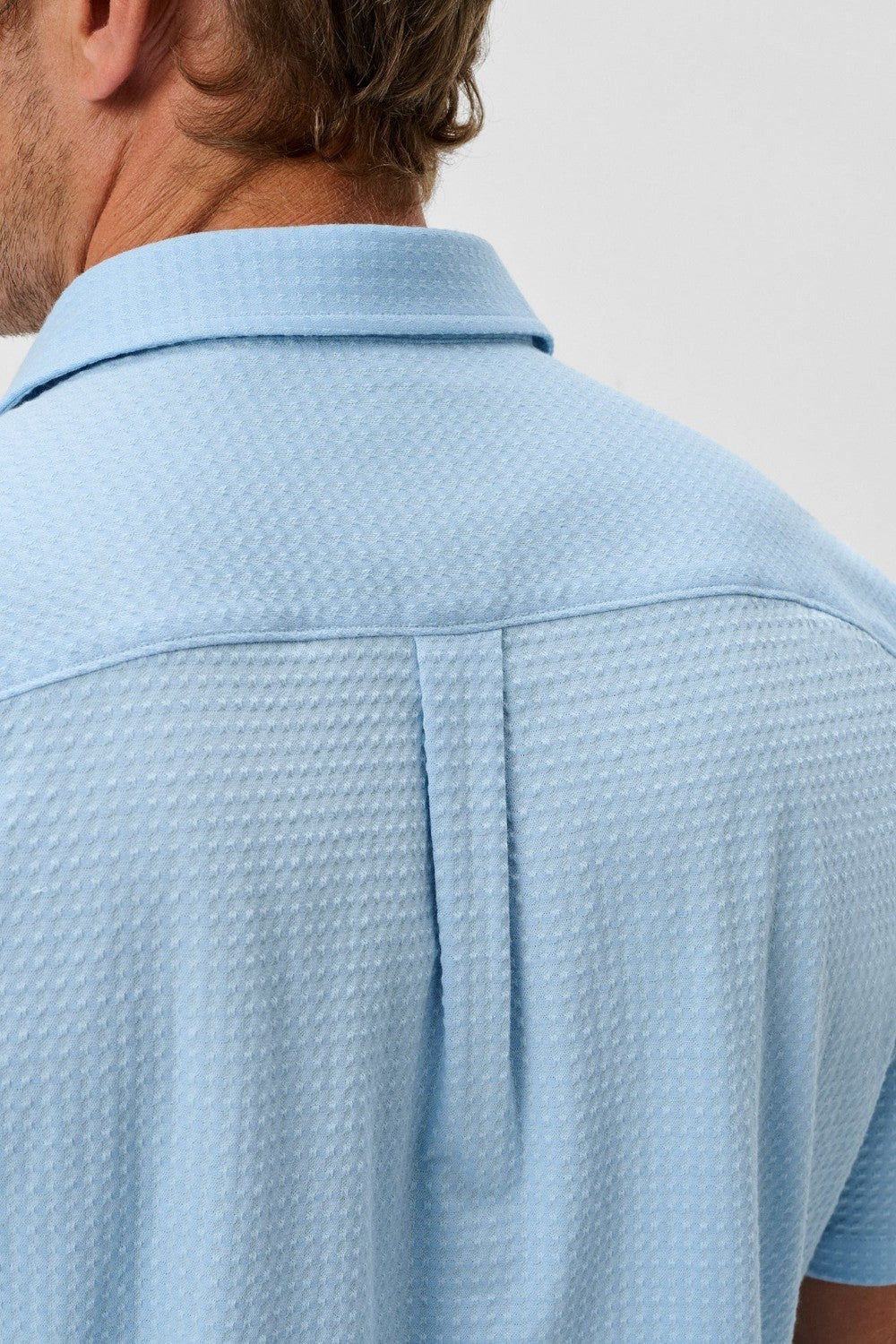 This knit button-down from our Hangin' Out Collection—which is designed to look its best untucked—is made with a modern seersucker fabric that breathes and moves better than the traditional. This is how you do elevated casual while staying completely comfortable.