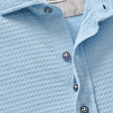 This knit button-down from our Hangin' Out Collection—which is designed to look its best untucked—is made with a modern seersucker fabric that breathes and moves better than the traditional. This is how you do elevated casual while staying completely comfortable.