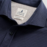 This knit button-down from our Hangin' Out Collection‚ which is designed to look its best untucked, is made with a modern seersucker fabric that breathes and moves better than the traditional. This is how you do elevated casual while staying completely comfortable.