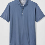 Blue textured polo shirt on a light gray background