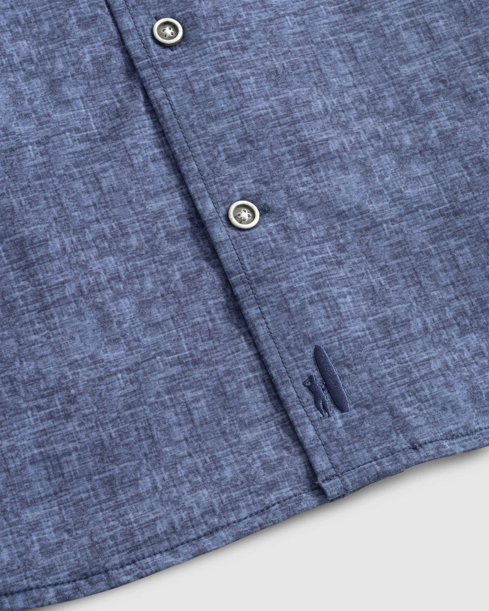 Designed to sit untucked, this shirt is cut like a button-up but with the fabric of a polo so you can take some of that performance comfort and blend it with some jeans or board shorts.