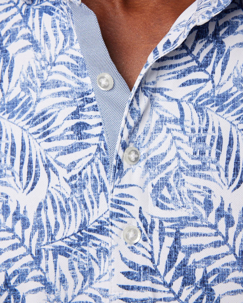 Planning a warm-weather getaway? Pack this tropical printed polo. Made with our signature performance mesh fabric, the Aiken will keep you cool and comfortable on and off the course. A chill floral print that looks sharp in the sun.