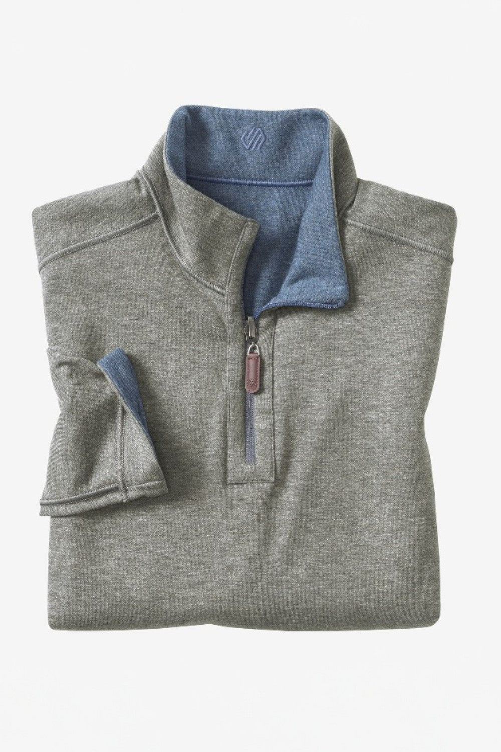 Get cozy and versatile with the Johnston &amp; Murphy 1/4 zip Reversible Fleece. Keep warm and stylish with the soft cotton-blend knit that reverses from a solid to a coordinating heather shade, and stay practical with the quarter zip placket and leather-look pull. Perfect for any occasion with tonal cover-stitch details.
