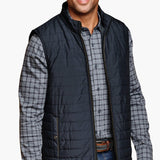 •Two distinct looks in one smart style.
•A versatile mid-weight layer, loaded with options.
•Quilted woven side reverses to a menswear stretch knit.