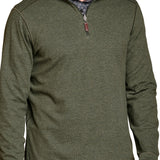 Man wearing a green pullover with a zipper, standing against a white background