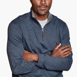 Get cozy and versatile with the Johnston &amp; Murphy 1/4 zip Reversible Fleece. Keep warm and stylish with the soft cotton-blend knit that reverses from a solid to a coordinating heather shade, and stay practical with the quarter zip placket and leather-look pull. Perfect for any occasion with tonal cover-stitch details.
