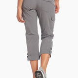 Gray capri pants worn by a person on a white background