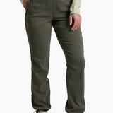 Person wearing olive green pants on a white background