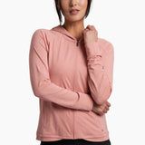 Woman wearing a pink hoodie on a white background