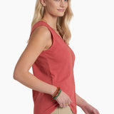 Woman wearing a red sleeveless top on a white background