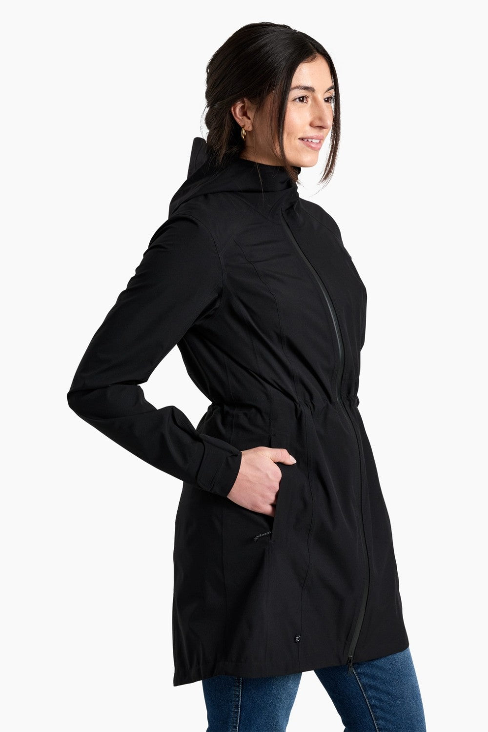 Woman wearing a black coat on a white background
