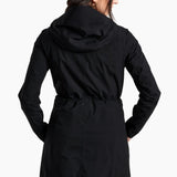 Person wearing a black hooded coat on a white background