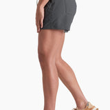Person wearing gray shorts on a white background