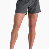 Person wearing gray shorts on a white background
