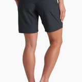 Person wearing black shorts on a white background