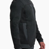 Man wearing a black jacket with a white background