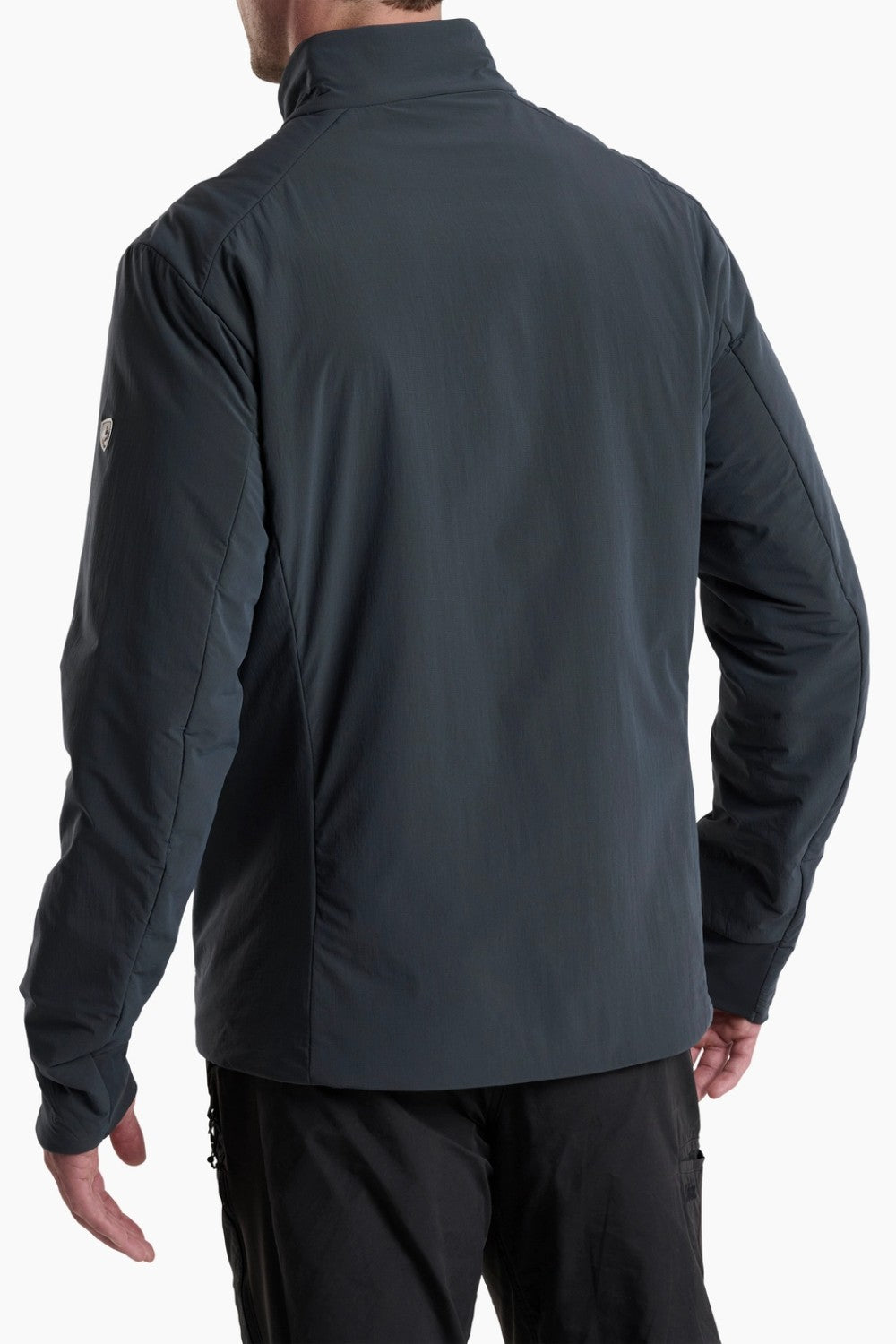 Person wearing a dark gray jacket on a white background
