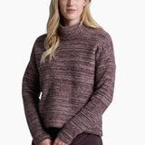 Woman wearing a maroon sweater and pants on a white background