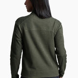 Person wearing a green fleece jacket on a white background