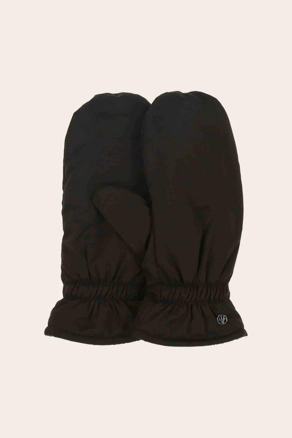 Pair of black mittens on a beige background