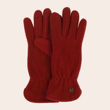 Red gloves on a beige background
