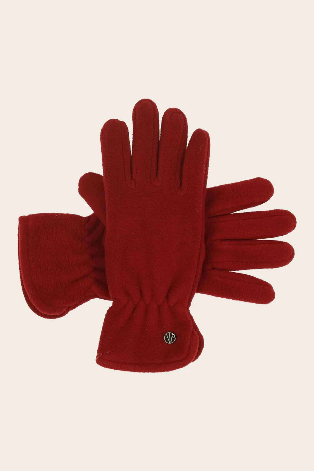 Red gloves with a brand logo on a beige background