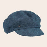 Blue cap on a beige background