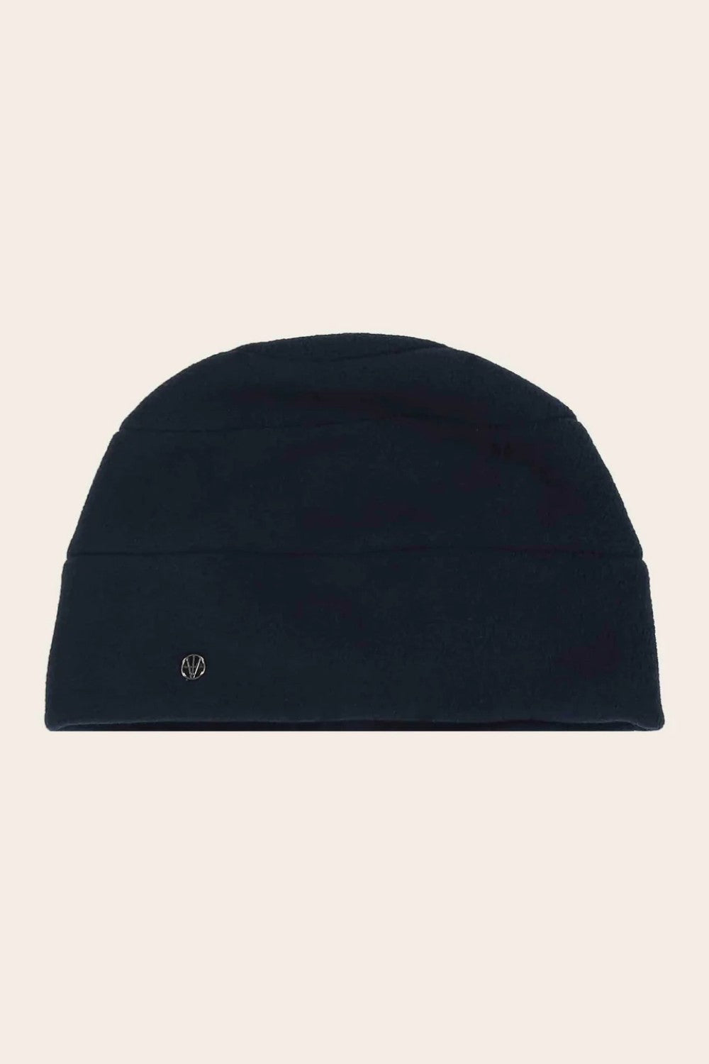 Navy beanie hat on a beige background