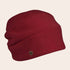 Red beanie hat with a small logo on a beige background