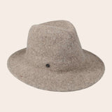 Tan fedora hat on a beige background