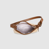 Two tone brown handbag on a light background