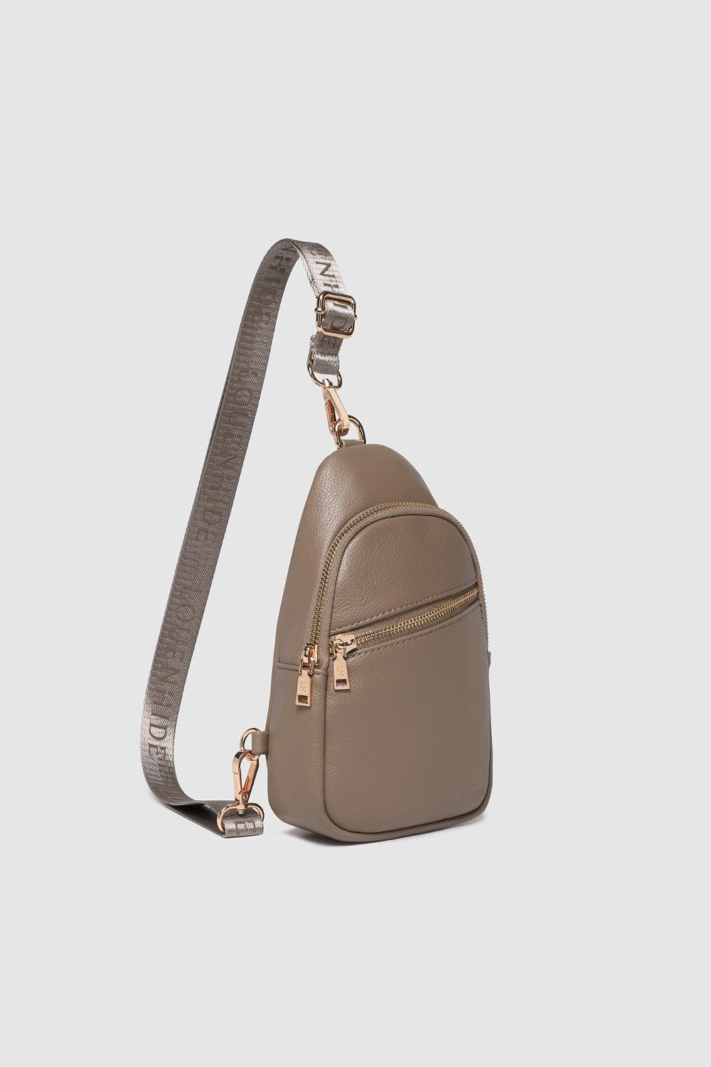 Beige crossbody bag with a strap on a light gray background