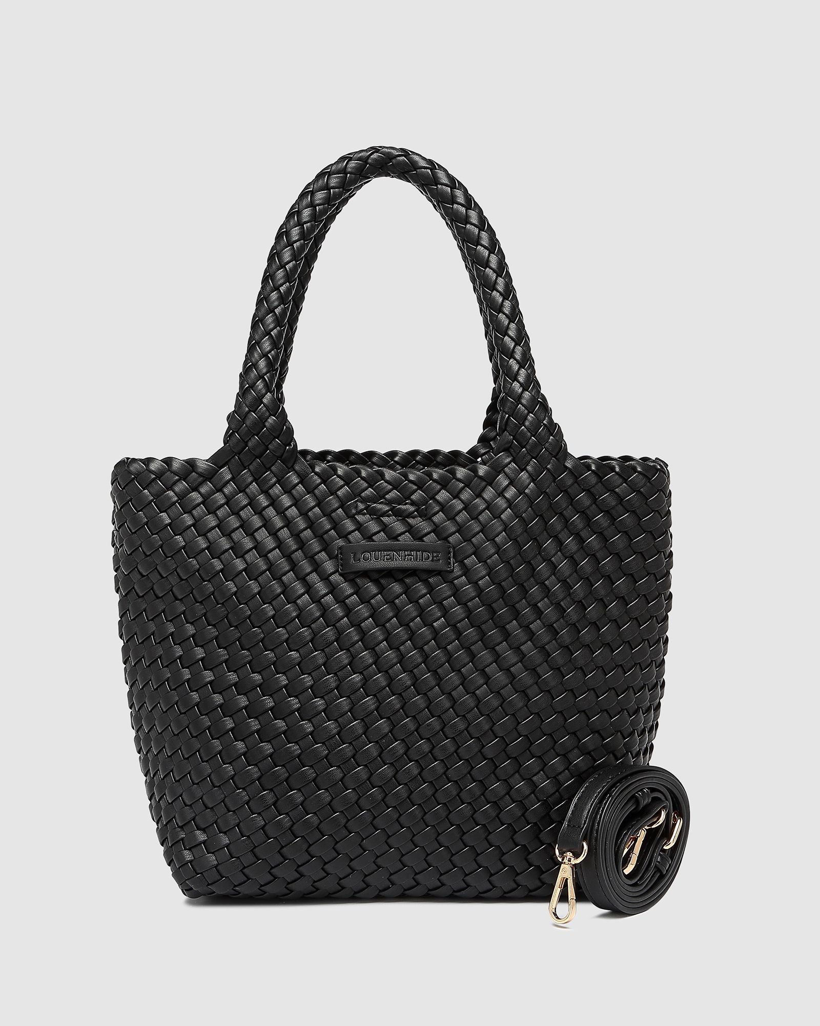 The Louenhide Baby Cruiser Woven Tote Bag is the epitome of laid-back elegance. Following on the woven trend, this women's woven tote bag will add the perfect touch of texture to your capsule wardrobe. Simply carry by the comfortable top handles or attach the adjustable crossbody strap for a hands-free moment when strolling around town. Elevate your style and carry your essentials with the Baby Cruiser Woven Tote Bag.