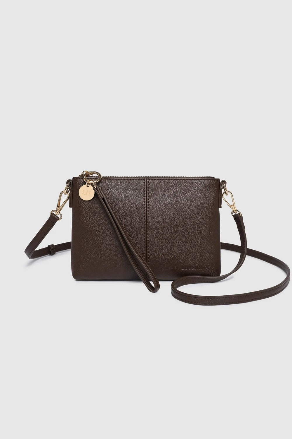 Brown leather crossbody bag on a light gray background