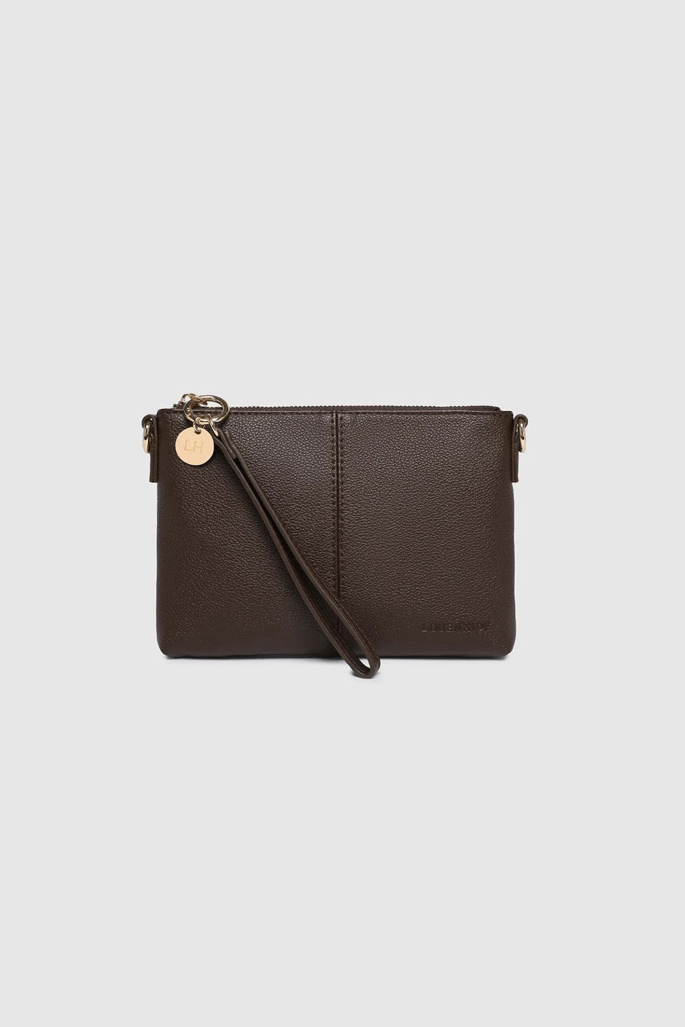 A dark brown pebbled leather clutch bag with a wristlet strap and a small gold-tone charm, shown against a light gray background.