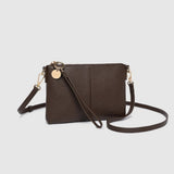 A dark brown faux-leather crossbody bag with a matching wristlet strap and gold-tone hardware, displayed on a light gray background.