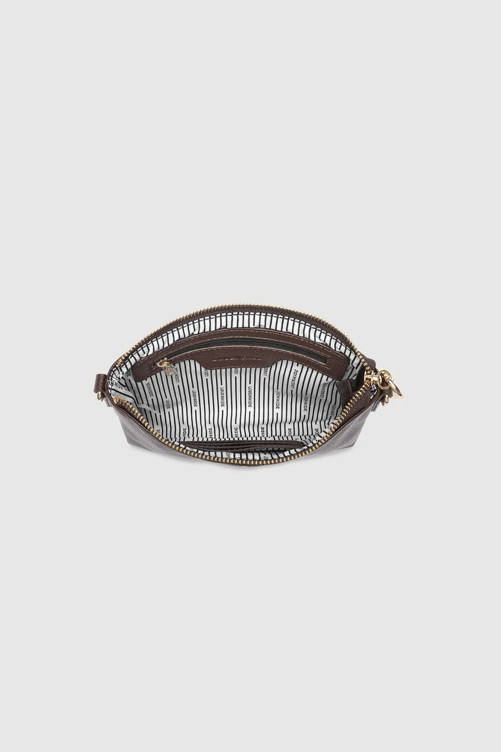 A small zippered pouch with a brown leather trim and a black-and-white striped interior lining, shown from a top-down view on a light gray background.