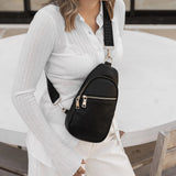 The Louenhide Bella Sling Bag is designed with both style and functionality in mind. Travel organization has never been easier with the dual compartment design ensuring your valuables are within reach and secured safely with the zip closures. Featuring an adjustable and detachable strap allows you to choose the way your bag slings. Whether over your left or right shoulder, this faux leather sling bag ensures comfortable all-day wear. This small sling backpack adds a refined touch to any casual outfit, enhan