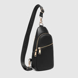 The Louenhide Bella Sling Bag is designed with both style and functionality in mind. Travel organization has never been easier with the dual compartment design ensuring your valuables are within reach and secured safely with the zip closures. Featuring an adjustable and detachable strap allows you to choose the way your bag slings. Whether over your left or right shoulder, this faux leather sling bag ensures comfortable all-day wear. This small sling backpack adds a refined touch to any casual outfit, enhan
