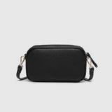 A black rectangular crossbody camera bag with a zippered top and an adjustable shoulder strap, shown on a light gray background.