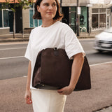 The Louenhide Blaire Tote Bag is the definition of an effortless, statement style. Designed with a bold and unique silhouette, this large tote bag is the perfect throw and go piece with an elevated edge. Designed to have a spacious interior, you can easily fit your daily essentials – and then some. Whether en route to work or heading out for the day, wear it over the shoulder or carry in hand, and let the day unfold. A refined take on an everyday essential, the Blaire Tote Bag blends structure and softness 