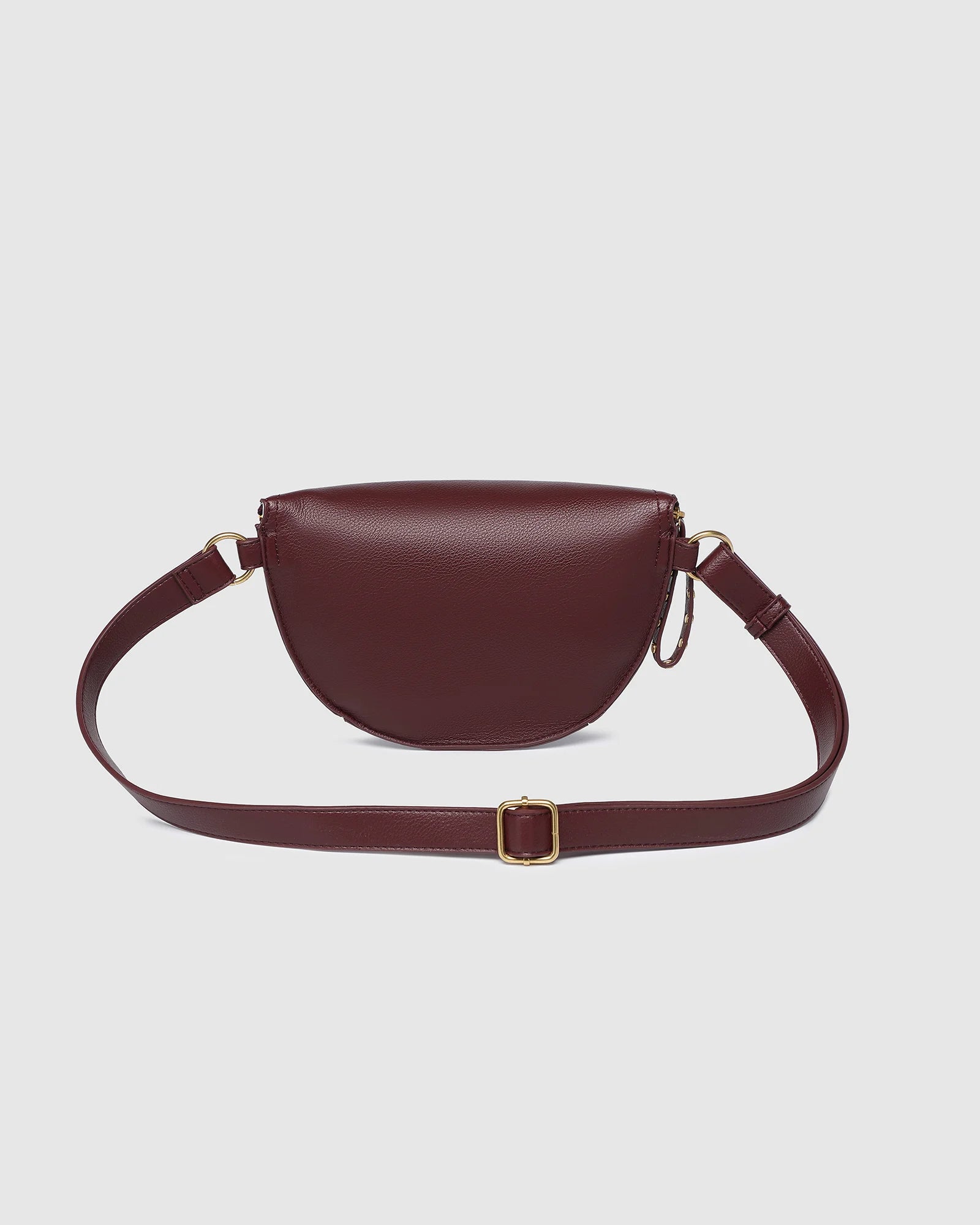 The Louenhide Cassidy Belt Bag is a bold staple designed to add a statement finish to your everyday styling. Crafted in a structured faux leather and adorned with refined hardware accents, this studded bag blends functionality with elevated design.