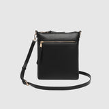 The Louenhide Cressida Crossbody Bag is your go-to for everyday ease and streamlined functionality. Designed in rich, seasonal hues, this crossbody handbag is both timeless and practical. The structured silhouette offers a spacious interior to keep your daily essentials organized, while the secure zip closures ensure everything stays in place. Whether worn over the shoulder or across the body, the adjustable strap lets you tailor the fit to suit your day. With subtle design detailing and a sleek shape, this