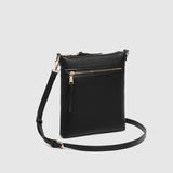 The Louenhide Cressida Crossbody Bag is your go-to for everyday ease and streamlined functionality. Designed in rich, seasonal hues, this crossbody handbag is both timeless and practical. The structured silhouette offers a spacious interior to keep your daily essentials organized, while the secure zip closures ensure everything stays in place. Whether worn over the shoulder or across the body, the adjustable strap lets you tailor the fit to suit your day. With subtle design detailing and a sleek shape, this