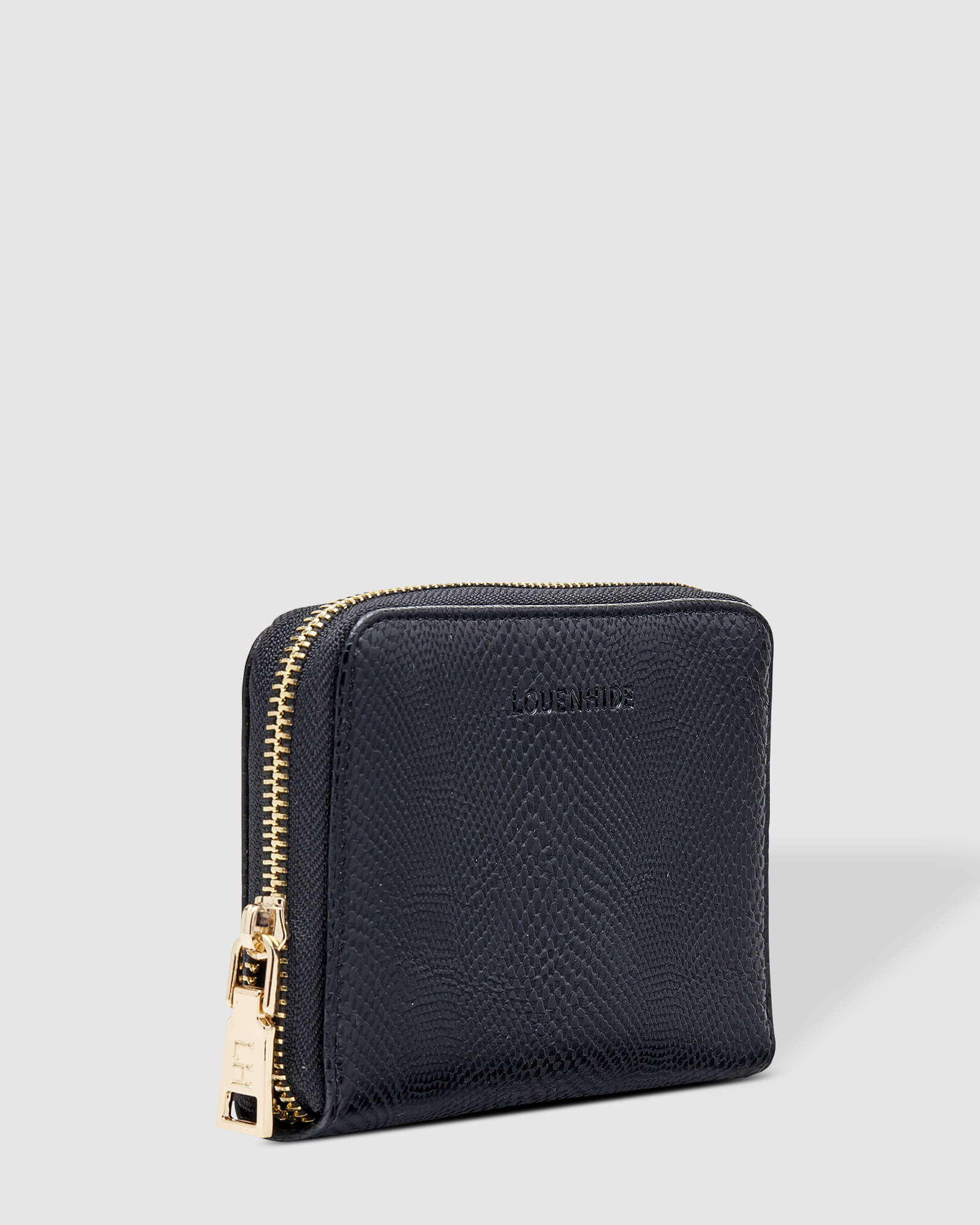 The Louenhide Eden Wallet is where functional simplicity meets enduring style. This classic everyday essential showcases a minimalistic design and clean lines on a smooth vegan leather exterior. Despite its compact size, the classic silhouette boasts ample space for your essentials.