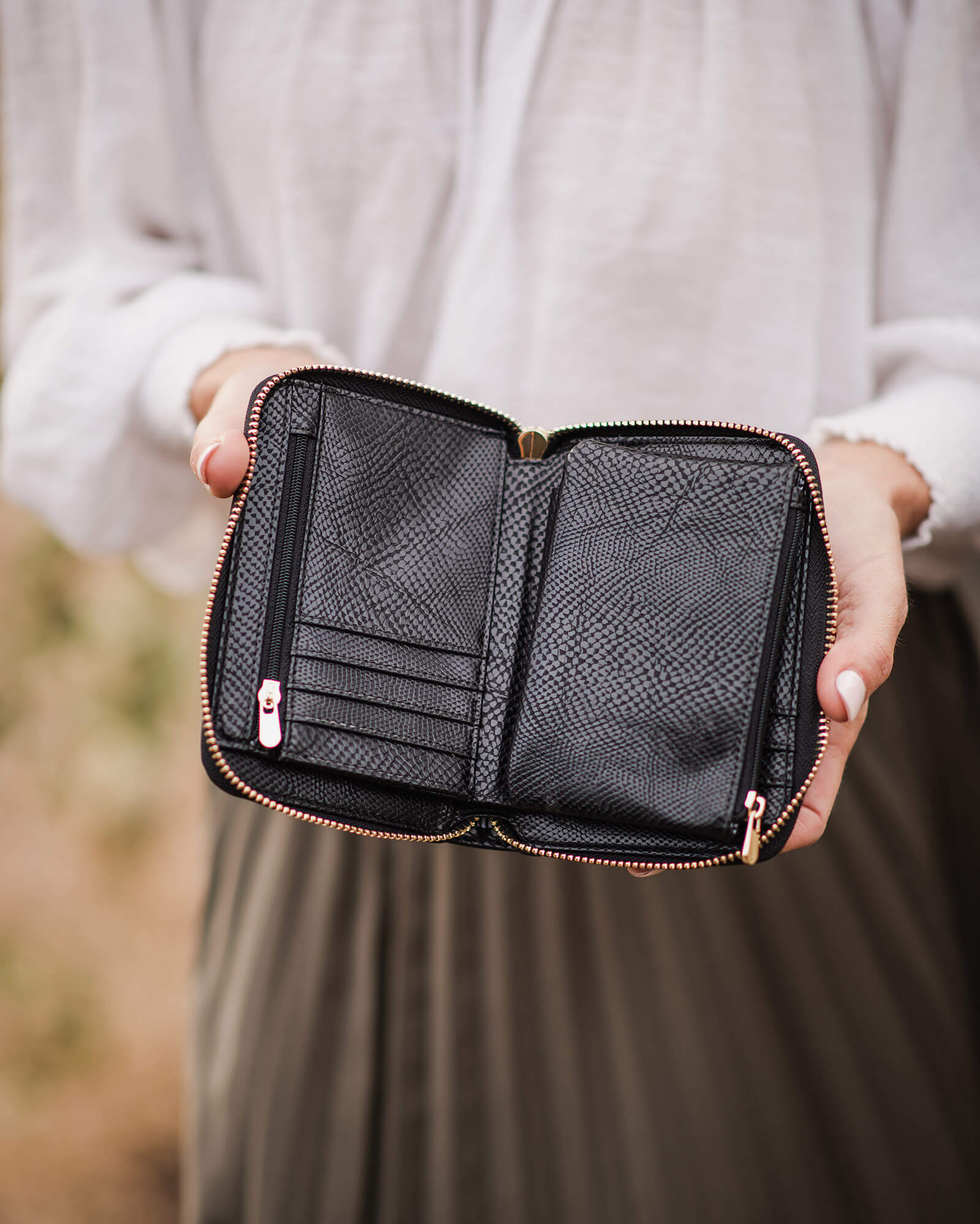 The Louenhide Eden Wallet is where functional simplicity meets enduring style. This classic everyday essential showcases a minimalistic design and clean lines on a smooth vegan leather exterior. Despite its compact size, the classic silhouette boasts ample space for your essentials.