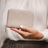 The Louenhide Eden Wallet is where functional simplicity meets enduring style. This classic everyday essential showcases a minimalistic design and clean lines on a smooth vegan leather exterior. Despite its compact size, the classic silhouette boasts ample space for your essentials. Stay organized at your convenience with multiple card holders, a dedicated slip pocket for your notes and receipts, and a zipped coin pocket to ensure you carry what you need without unnecessary bulk.