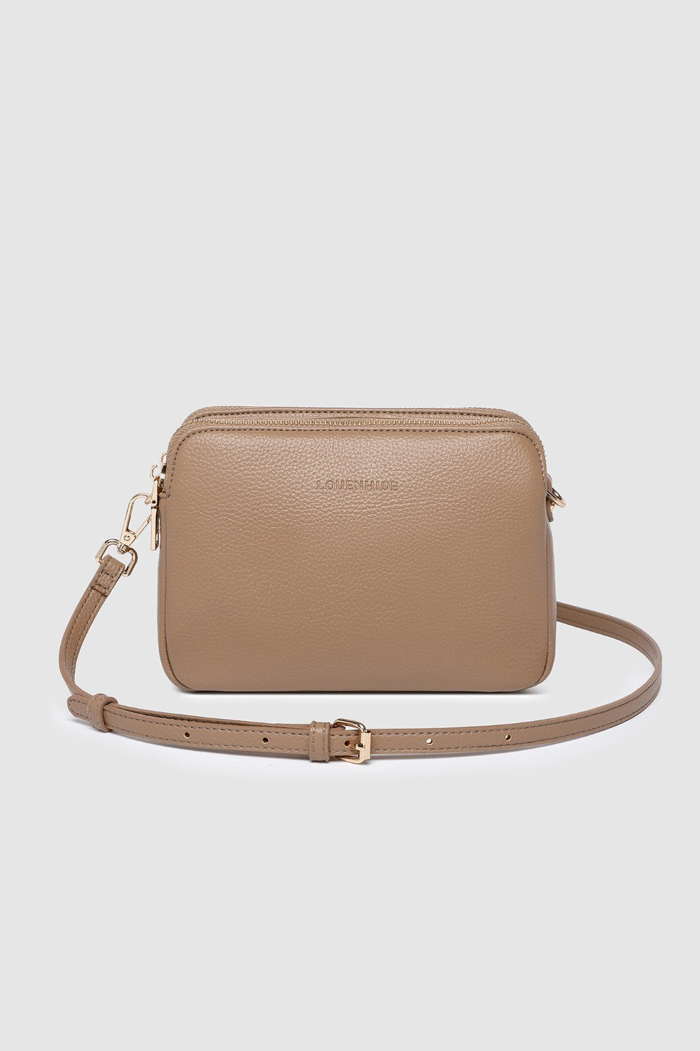 Beige crossbody bag on a light gray background